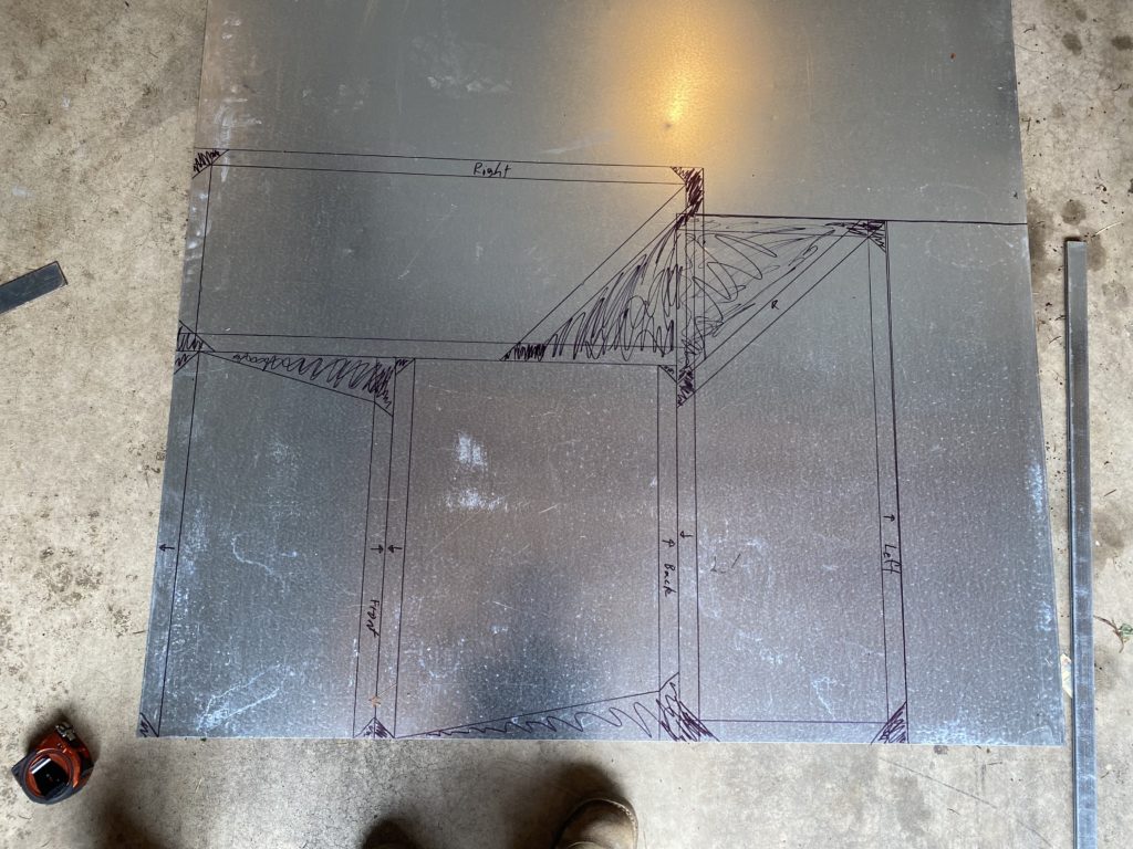 Cutting lines drawn on roll of sheet metal